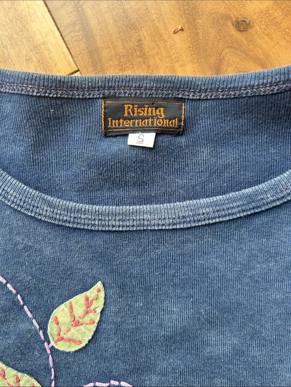 Rising International Navy Long Sleeve Top with rust and green Floral Appliqués - Picture 2 of 3